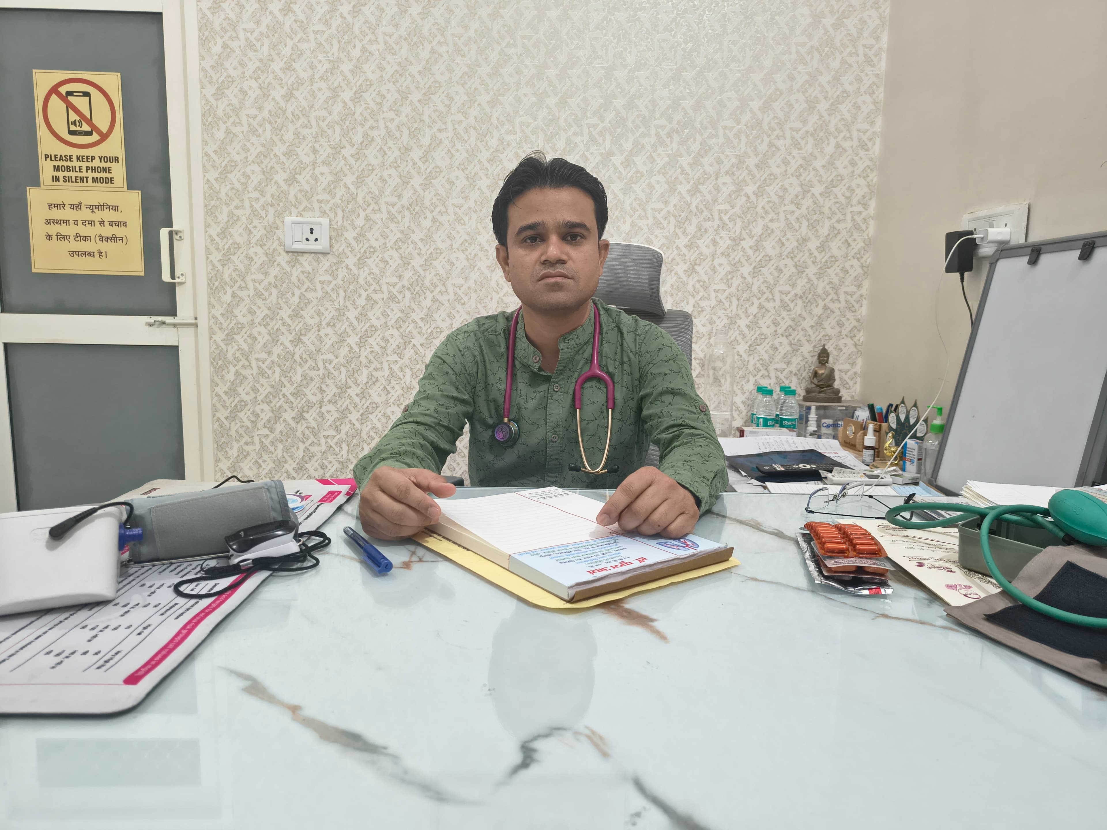 Dr. Pooran Arya
